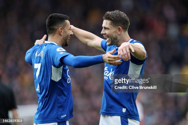 James Tarkowski of Everton celebrates with team mate Dwight McNeil after scoring the team's first goal during the Premier League match between...