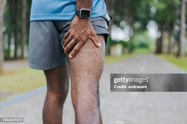 man thigh leg pain - thigh stock pictures, royalty-free photos & images