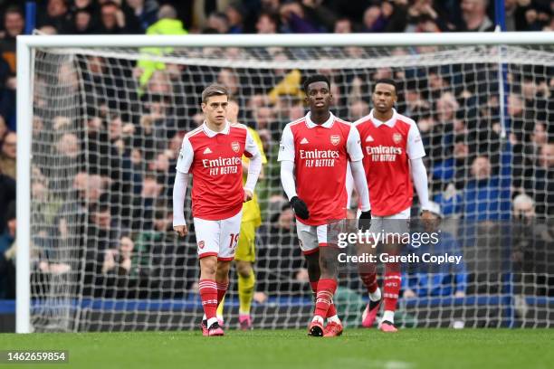 Leandro Trossard and Eddie Nketiah of Arsenal look dejected after James Tarkowski of Everton scores their sides first goal during the Premier League...