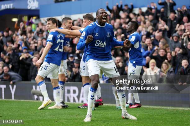 Abdoulaye Doucoure of Everton celebrates after James Tarkowski of Everton scores their team's first goal during the Premier League match between...