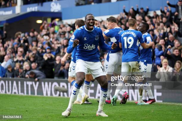 Abdoulaye Doucoure of Everton celebrates after James Tarkowski of Everton scores their team's first goal during the Premier League match between...