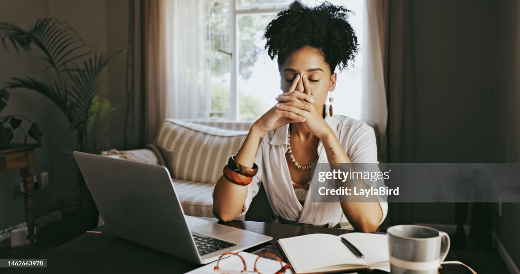 Stress, headache and work from home woman planning, writing and creative research for mental health problem. Laptop, digital person and writer fatigue, burnout or frustrated for online startup budget