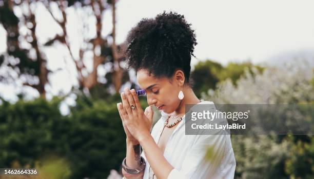 spiritual, woman pray and nature with zen yoga and meditation for peace and wellness. mindfulness exercise, prayer and chakra energy health of a person with balance and calm worship for healing - healing prayer images stock pictures, royalty-free photos & images