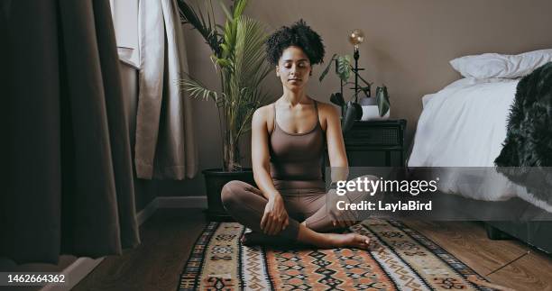 zen, relax and mediation with black woman and yoga in bedroom for calm, peace and morning routine. wellness, breathing and balance with health girl training at home for spiritual, healing and energy - meditera bildbanksfoton och bilder