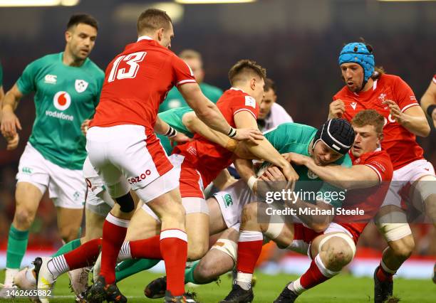 James Ryan of Ireland is tackled by Jac Morgan of Wales during the Six Nations Rugby match between Wales and Ireland at Principality Stadium on...