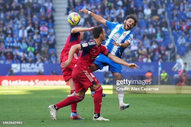 Darko Brasanac of CA Osasuna battles for possession with Martin Braithwaite of RCD Espanyol during the LaLiga Santander match between RCD Espanyol...