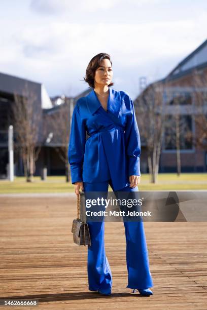 Guest wears Daige pant and top with an Anna Amelie bag during Budapest Central European Fashion Week AW 23/24 on February 4, 2023 in Budapest,...