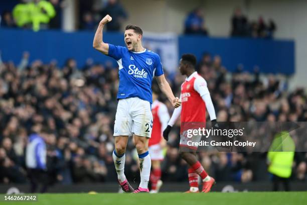 James Tarkowski of Everton celebrates following their sides victory after the Premier League match between Everton FC and Arsenal FC at Goodison Park...