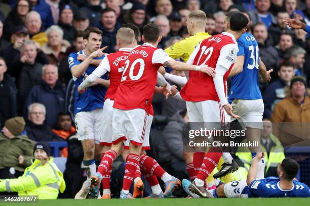 Seamus Coleman of Everton clashes with Oleksandr Zinchenko of Arsenal during the Premier League match between Everton FC and Arsenal FC at Goodison...