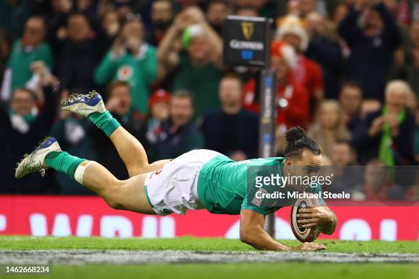 James Lowe of Ireland dives over the line to score their side's third try during the Six Nations Rugby match between Wales and Ireland at...