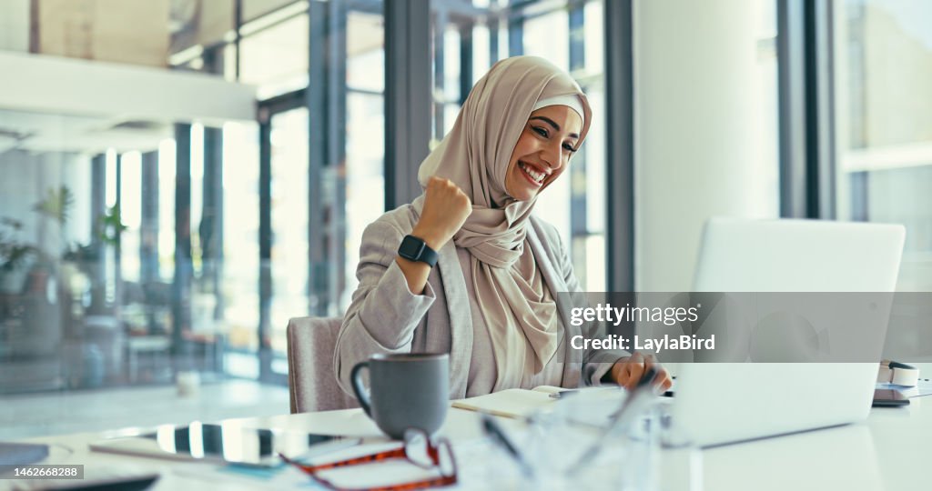 Office laptop, excited celebration and muslim woman finish review of finance portfolio, stock market or investment. Online crypto trading, success or Islamic trader with nft, forex or profit