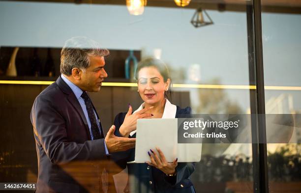 business people with laptop at office - south asia stock pictures, royalty-free photos & images