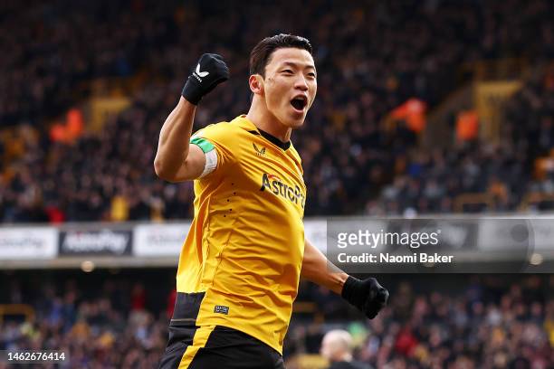 Hwang Hee-chan of Wolverhampton Wanderers celebrates their side's first goal, an own goal by Joel Matip of Liverpool during the Premier League match...