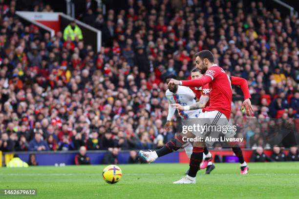 Bruno Fernandes of Manchester United scores their sides first goal from the penalty spot during the Premier League match between Manchester United...