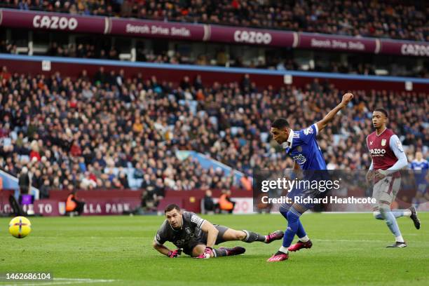 Tete of Leicester City scores their sides third goal past Emiliano Martinez of Aston Villa during the Premier League match between Aston Villa and...