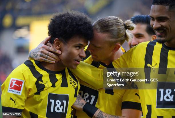 Karim Adeyemi of Borussia Dortmund celebrates after scoring his team's second goal with Marius Wolf during the Bundesliga match between Borussia...