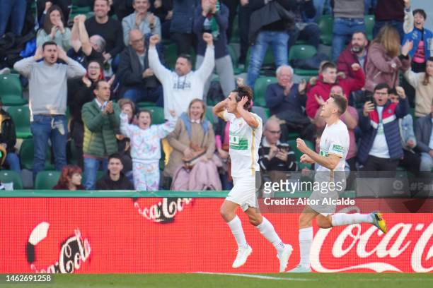 Pere Milla of Elche CF celebrates after scoring their sides second goal during the LaLiga Santander match between Elche CF and Villarreal CF at...