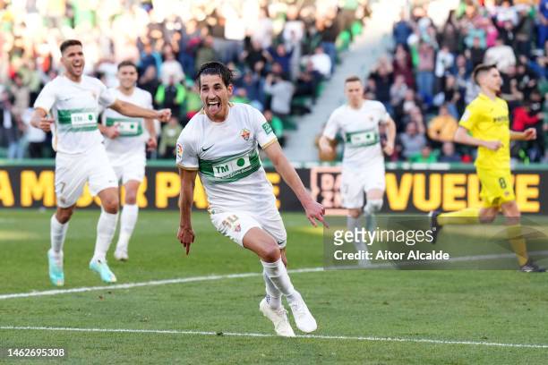 Pere Milla of Elche CF celebrates after scoring their sides third goal during the LaLiga Santander match between Elche CF and Villarreal CF at...
