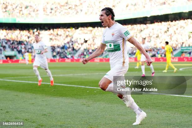 Pere Milla of Elche CF celebrates after scoring their sides third goal during the LaLiga Santander match between Elche CF and Villarreal CF at...