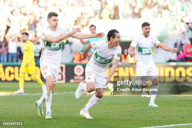 Pere Milla of Elche CF celebrates after scoring their sides third goal during the LaLiga Santander match between Elche CF and Villarreal CF at...