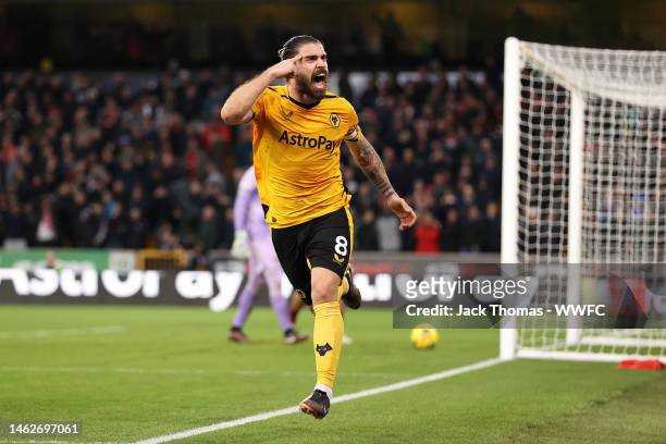 Ruben Neves of Wolverhampton Wanderers celebrates after scoring the team's third goal during the Premier League match between Wolverhampton Wanderers...