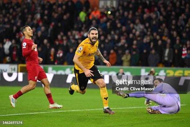 Ruben Neves of Wolverhampton Wanderers celebrates after scoring the team's third goal during the Premier League match between Wolverhampton Wanderers...