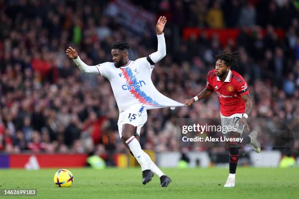 Jeffrey Schlupp of Crystal Palace is challenged by Fred of Manchester United during the Premier League match between Manchester United and Crystal...