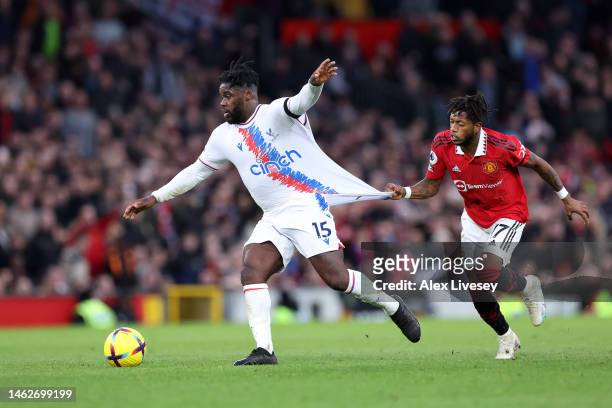 Jeffrey Schlupp of Crystal Palace is challenged by Fred of Manchester United during the Premier League match between Manchester United and Crystal...