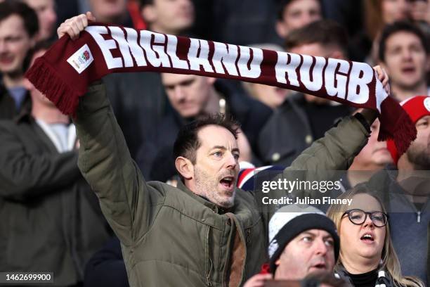 An England fan shows their support prior to the Six Nations Rugby match between England and Scotland at Twickenham Stadium on February 04, 2023 in...
