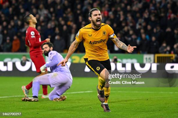 Ruben Neves of Wolverhampton Wanderers celebrates after scoring the team's third goal during the Premier League match between Wolverhampton Wanderers...