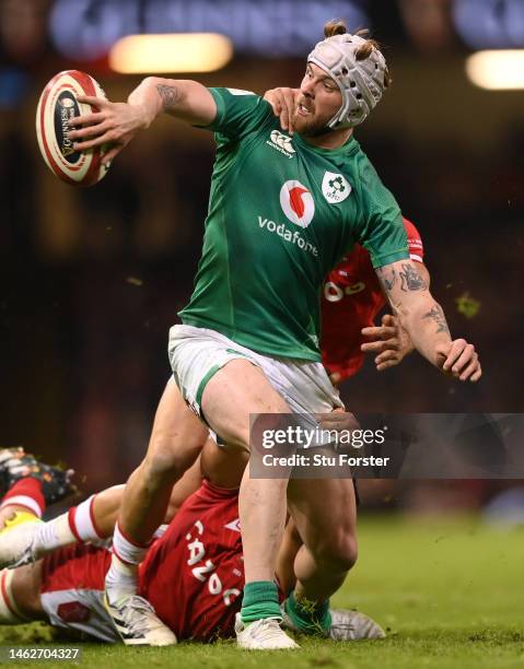 Mack Hansen of Ireland in action during the Six Nations Rugby match between Wales and Ireland at Principality Stadium on February 04, 2023 in...