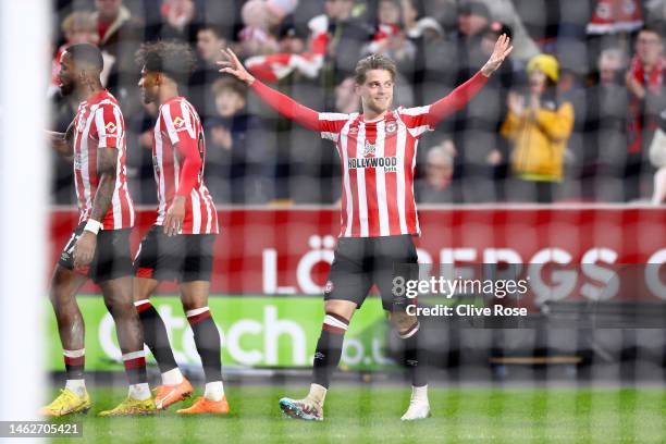 Mathias Jensen of Brentford celebrates after scoring the team's third goal during the Premier League match between Brentford FC and Southampton FC at...