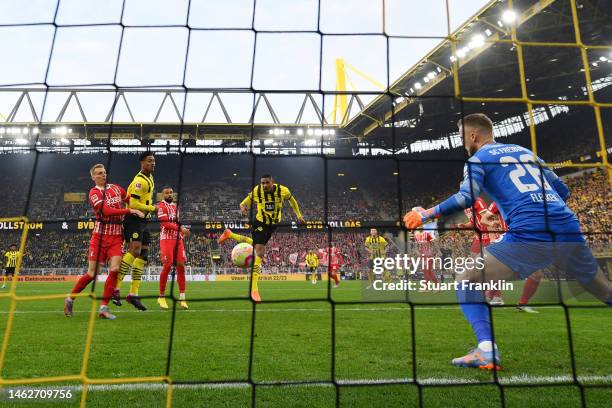 Sebastien Haller of Borussia Dortmund scores their sides third goal during the Bundesliga match between Borussia Dortmund and Sport-Club Freiburg at...