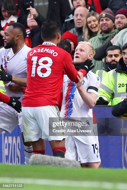 Casemiro of Manchester United clashes with Will Hughes of Crystal Palace leading to a red card decision during the Premier League match between...