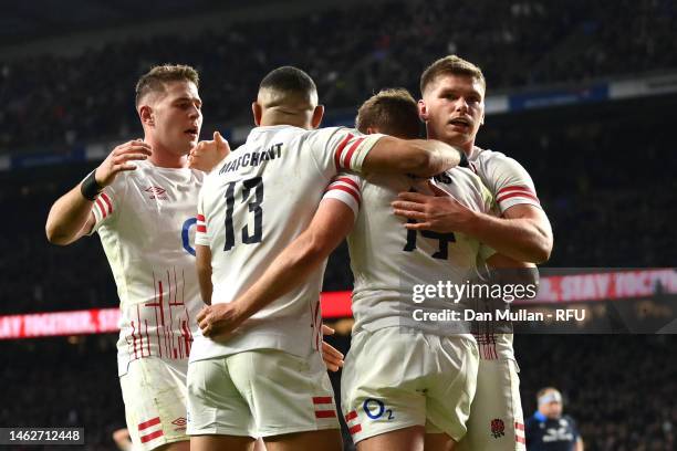 Max Malins of England celebrates with teammates after the sides second try during the Six Nations Rugby match between England and Scotland at...