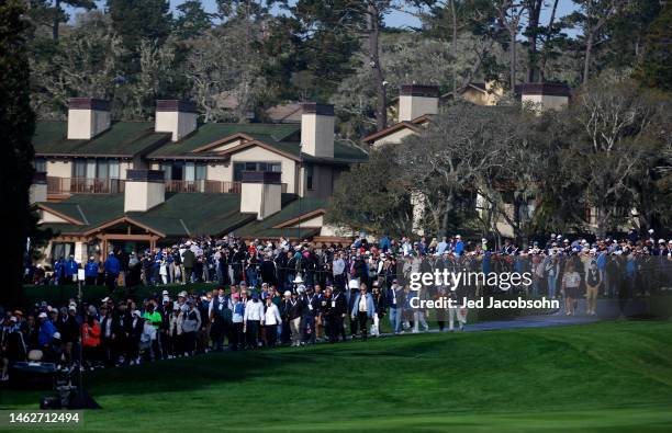 Crowds walk along the second hole during the third round of the AT&T Pebble Beach Pro-Am at Pebble Beach Golf Links on February 04, 2023 in Pebble...
