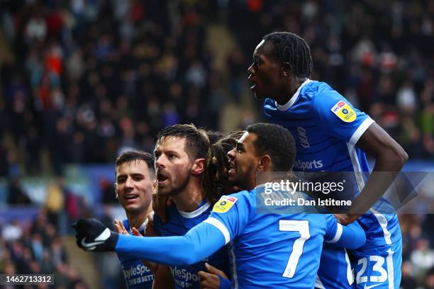 Lukas Jutkiewicz of Birmingham celebrates with team-mates after scoring his team's third goal goal during the Sky Bet Championship between Swansea...