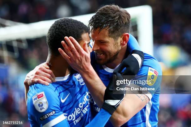 Lukas Jutkiewicz of Birmingham celebrates with team-mate Juninho Bacun after scoring his team's third goal goal during the Sky Bet Championship...