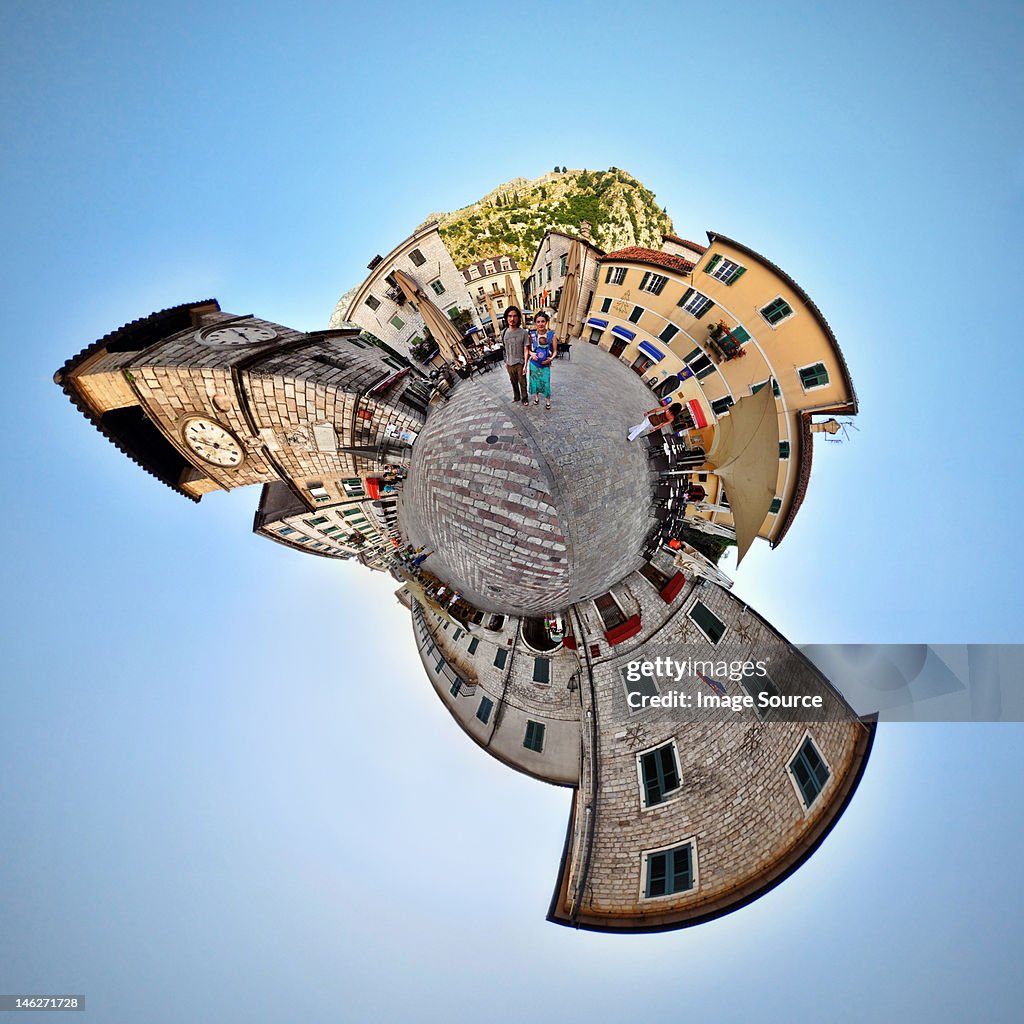 Family on vacation in Kotor, Montenegro, little planet effect