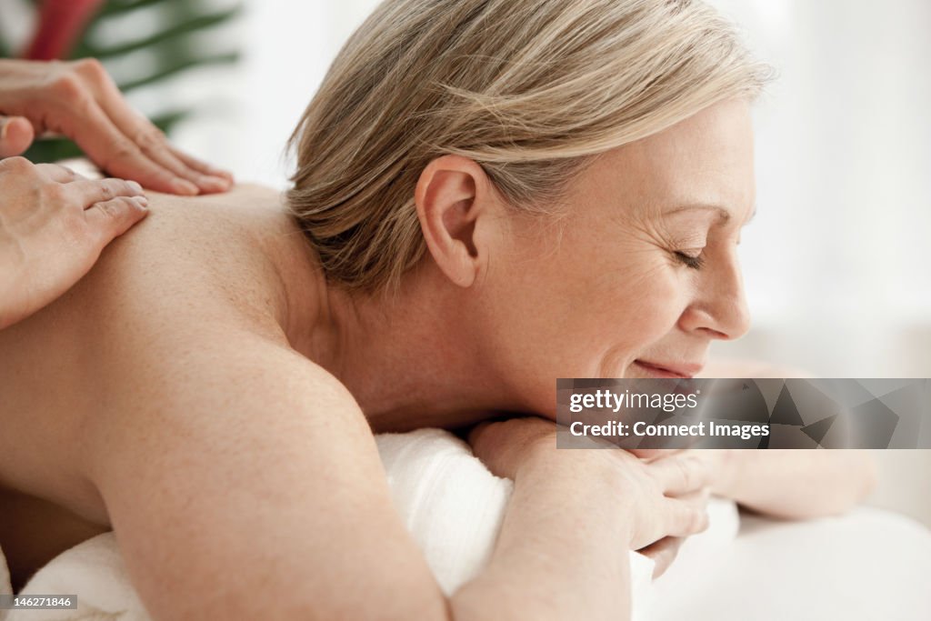 Mature woman receiving massage