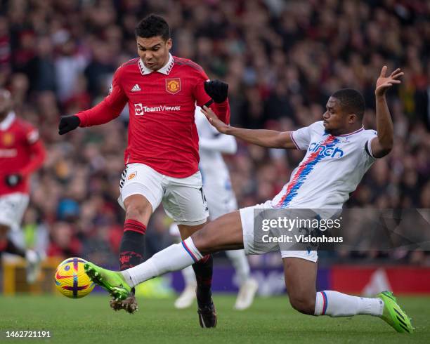 Casemiro of Manchester United and Cheick Doucoure of Crystal Palace in action during the Premier League match between Manchester United and Crystal...