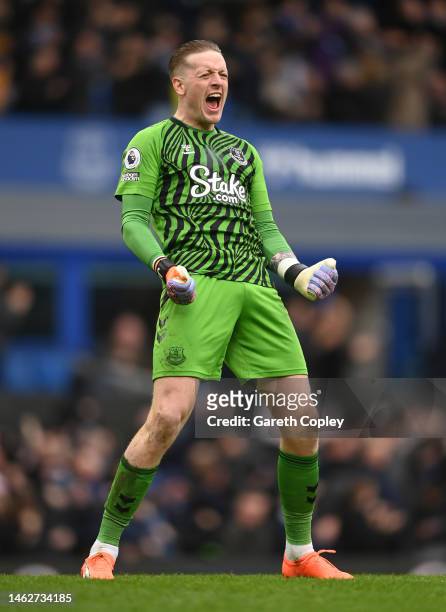 Jordan Pickford of Everton celebrates during the Premier League match between Everton FC and Arsenal FC at Goodison Park on February 04, 2023 in...