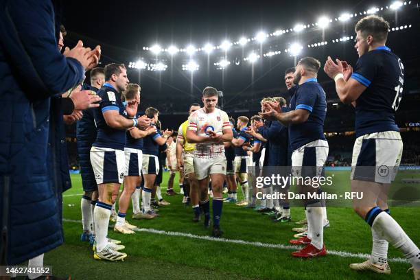 Scotland players give a guard of honour to England players after the Six Nations Rugby match between England and Scotland at Twickenham Stadium on...