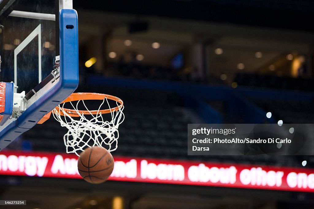 Basketball in hoop, blurred motion