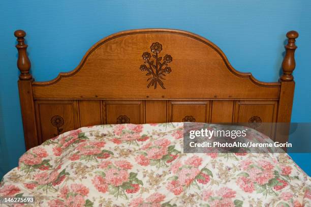bed with wooden headboard - headboard stock pictures, royalty-free photos & images