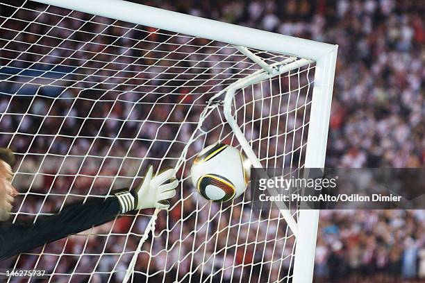 soccer goalkeeper diving to block ball - soccer net stock pictures, royalty-free photos & images