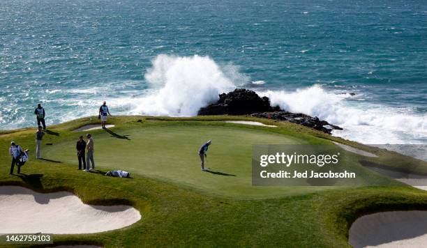 Matt Fitzpatrick of England putts on the seventh green during the third round of the AT&T Pebble Beach Pro-Am at Pebble Beach Golf Links on February...