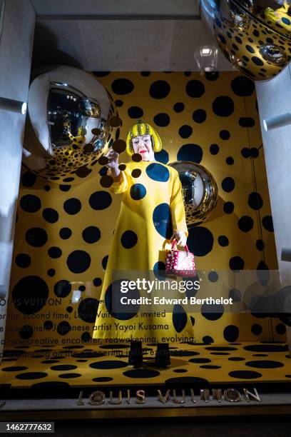 The facade of the Louis Vuitton Store displays a Yayoi Kusama robot and mirrors at Place Vendome on February 04, 2023 in Paris, France.