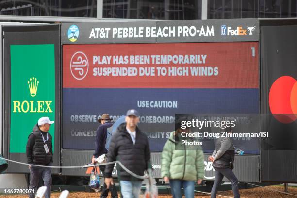 Signboard notes that play had been suspended due to high winds during the third round of the AT&T Pebble Beach Pro-Am at Pebble Beach Golf Links on...