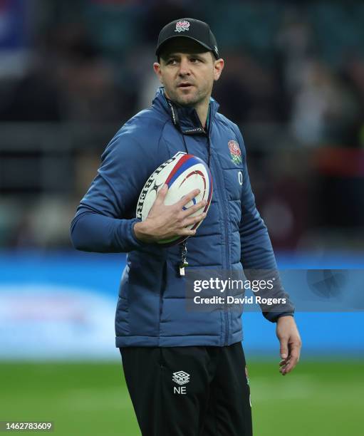 Nick Evans, the England attack coach looks on in the warm up during the Six Nations Rugby match between England and Scotland at Twickenham Stadium on...